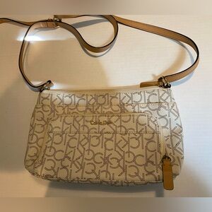 Calvin Klein Monogram Logo Zip Top Womens Swing Bag Almond Caramel